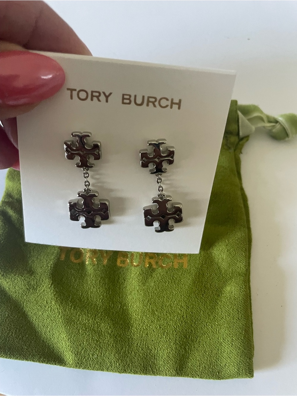 Tory Burch drop earrings silver tone